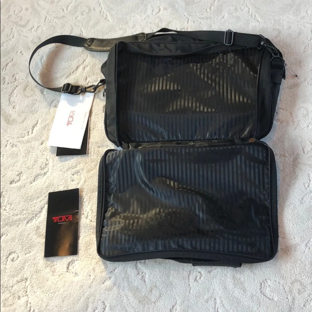 Tumi expandable crossbody suitcase/briefcase